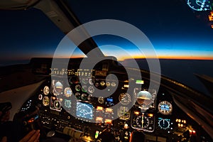 Sunset seen from a business jet cockpit