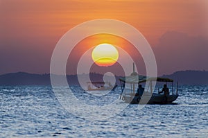 Sunset seen from Ribeira beach in Salvador, Bahia, Brazil.