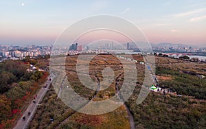 Sunset in Seoul. Aerial Cityscape. South Korea. Skyline of City. Mapo District. Haneul Park in Background. Han River photo
