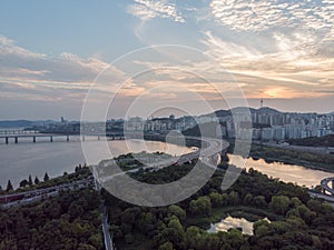 Sunset in Seoul. Aerial Cityscape. South Korea. Skyline of City. Seongdong District. Han River in Background