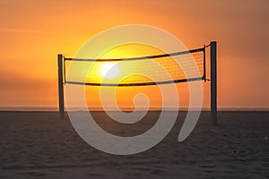 Sunset Shines Through Beach Volleyball net