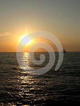 Sunset and ships on the sea