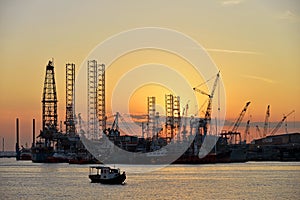 Sunset At A Shipyard