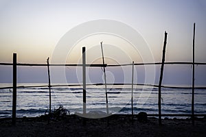 Sunset silhouette at Lakshadweep, is a tropical atolls and coral reefs in the Laccadive Sea. photo