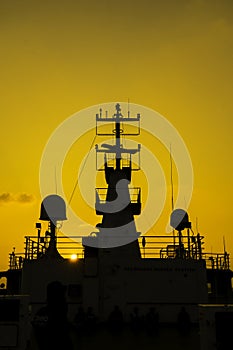 Sunset silhouette at Lakshadweep, is a tropical atolls and coral reefs in the Laccadive Sea. photo
