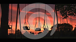 Sunset Silhouette of Swings