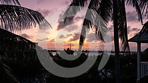 Sunset silhouette of tropical vacation homes in the florida keys