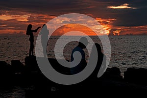 Sunset Silhouettes on the Beach