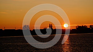 Sunset. Silhouettes of houses