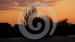 Sunset. Silhouettes of houses