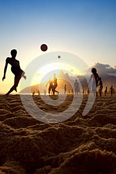 Sunset Silhouettes Playing Altinho Futebol Beach Football Brazil photo