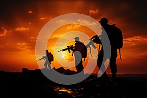 Sunset silhouettes of a team of soldiers or officers with weapons