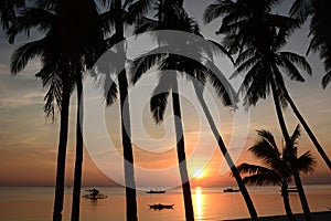 Sunset silhouettes. White beach, station three. Boracay Island. Western Visayas. Philippines