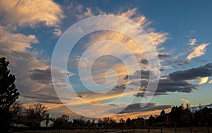 Sunset skies in the fall over the suburban neighborhood