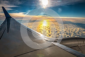 Sunset sky on airplane, view through plane window
