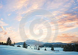 sunset sky background with alpine landscape buckelwiesen and view to Wetterstein mountains