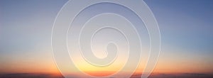 Sunset sky background. Panoramic view of sunset sky.