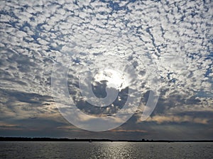 Sunset sky with clouds over polish Mazury lakes in summer