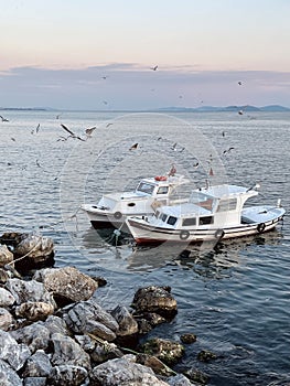 Sunset sky clouds, sea and yacht