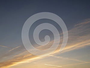 Sunset sky with diagonal cloud. Amazing nature scenery. Abstract background for design and sky replacement