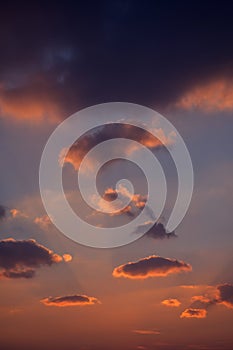 Sunset sky with orange clouds.