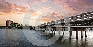 Sunset sky over bridge over Hickory Pass leading to the ocean in Bonita Springs photo