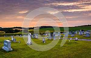 Sunset sky over cemetery in rural York County, Pennsylvania.