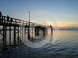 Sunset sky over Mobile Bay, Alabama at Daphne Bayfront Park on the Gulf Coast waterfront