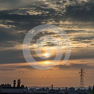 Sunset sky over mountains and electricity pylon, Kanazawa, Japan