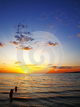 Sunset sky over sea at dusk