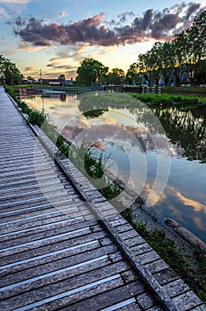 Sunset sky reflection in water in Strasbourg