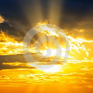 Sunset sky with sunset clouds and sun rays