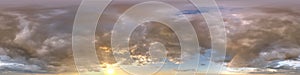 sunset skydome with evening clouds and rainbow as seamless hdri 360 panorama in spherical equirectangular format for use in 3d photo