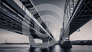 Sunset skyline and landscape of bridge over river. Evening city