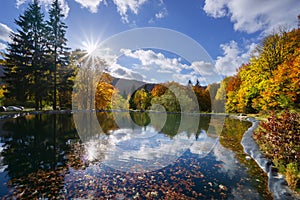 Sunset on small lake on Salasky on Velka Fatra