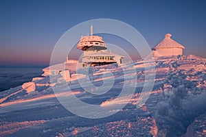 Sunset on Sniezka mountain during winter in Karkonosze Poland