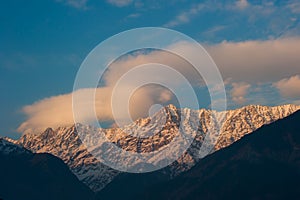 Sunset snow peak view in Winter at Sidhpur village in Dharamsal