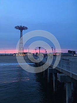 Sunset in Spring at Coney Island Steeplechase Pier in Brooklyn, New York, NY.