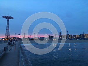 Sunset in Spring at Coney Island Steeplechase Pier in Brooklyn, New York, NY.