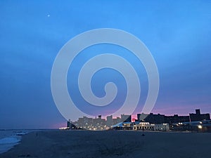 Sunset in Spring at Coney Island Steeplechase Pier in Brooklyn, New York, NY.