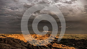 Sunset and storm clouds, Badlands National Park, South Dakota