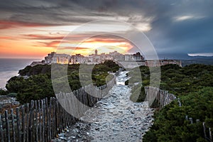 Sunset and storm over the Old Town of Bonifacio