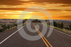 Evening Sun on Hog`s Back Road and Southwest Desert Landscape at Sunset, Grand Staircase Escalante National Monument, Utah, USA