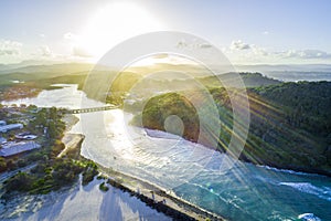 Sunset with sun flare over Tallebudgera creek.