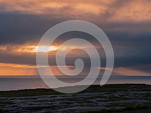 Sunset sun over ocean, Sepia warm tone. Galway bay, Atlantic ocean