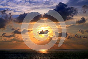 Sunset and Sunbeams through Tropical Clouds Formation over Acapulco Bay