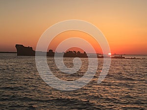 Sunset at the sunken ship photo