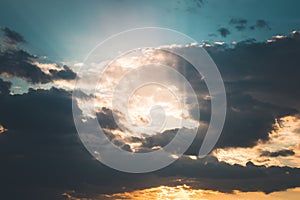 Sunset or sunrise with clouds, light rays