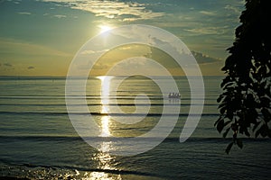 Sunset and sunrise with dramatic sky over ocean