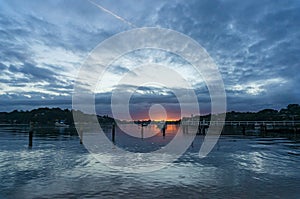 Sunset, sunrise landscape with yachts on tropical lagoon